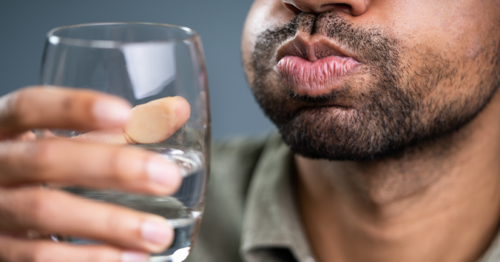 man using natural mouthwash and gargle his bad breath away