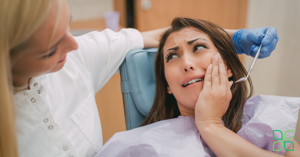 dentist looking at dental pain