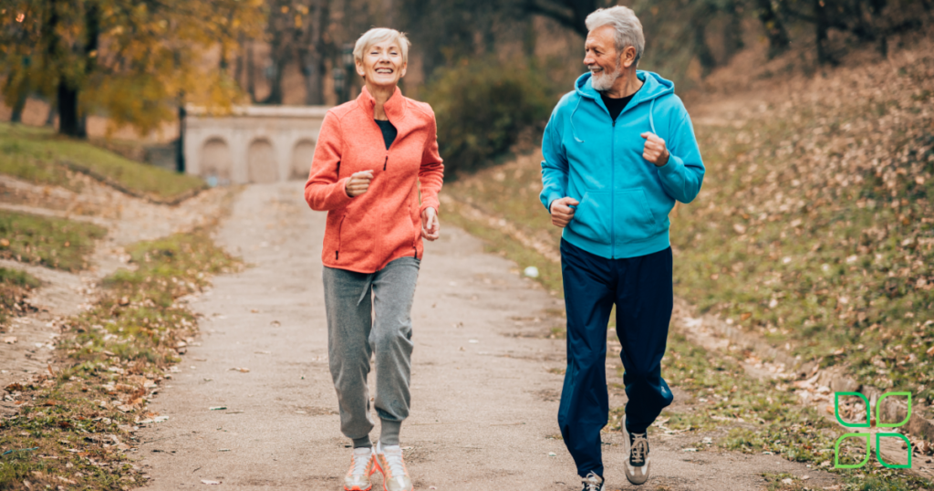 elderly couple running keeping fit