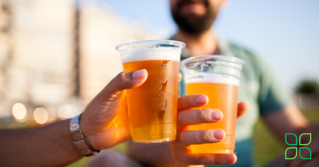 guys toasting their beers