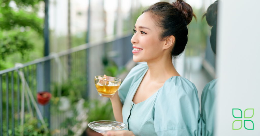 pretty woman enjoying tea