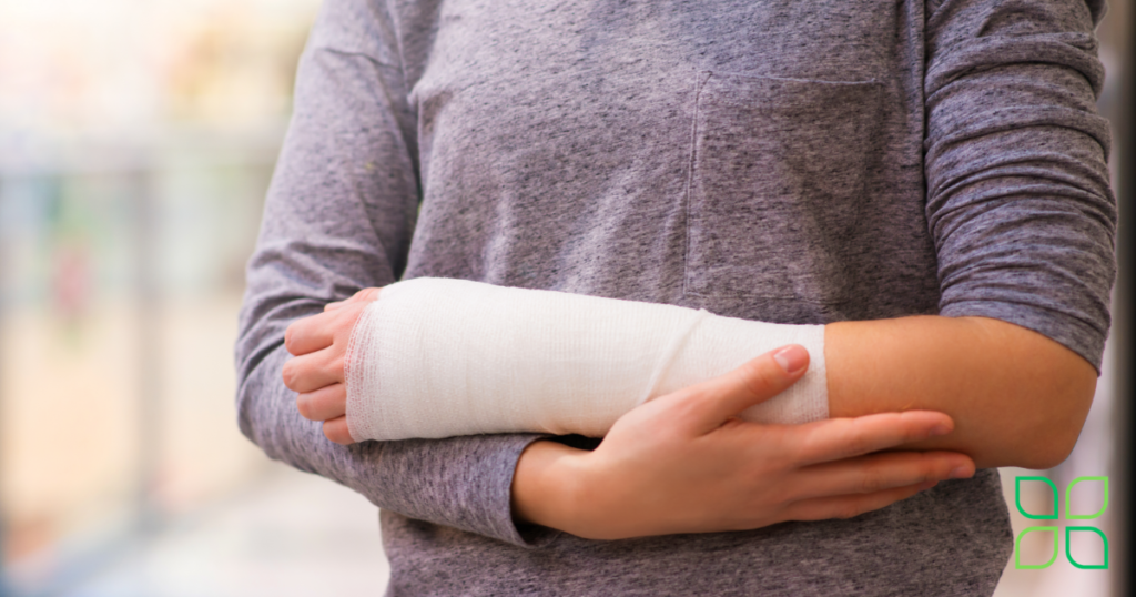 woman with bandage on her arm