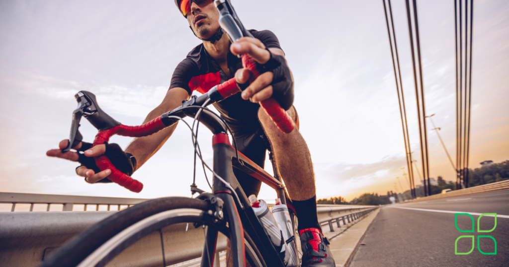 Athlete riding bike